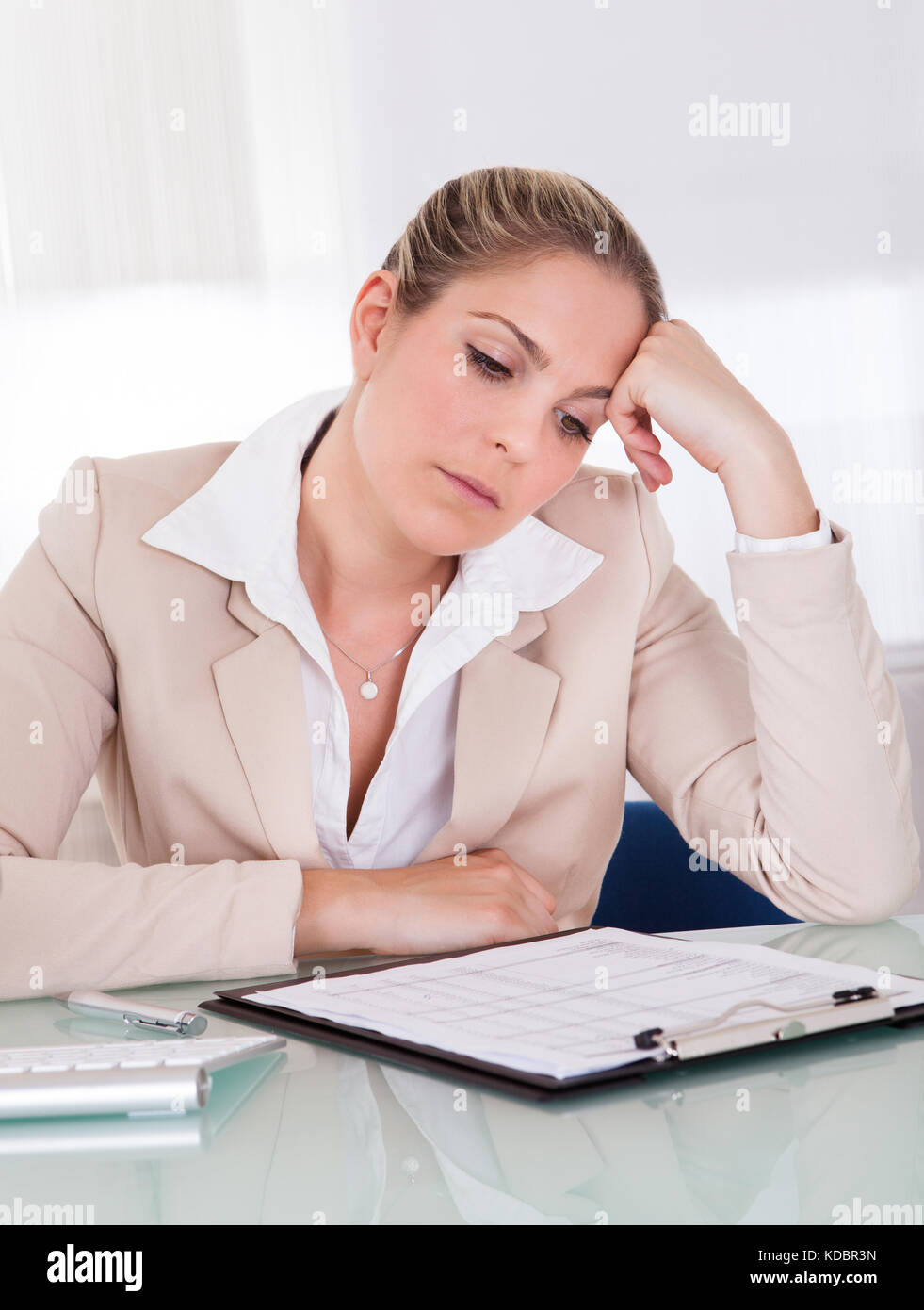 Stressful business woman working in the office Stock Photo