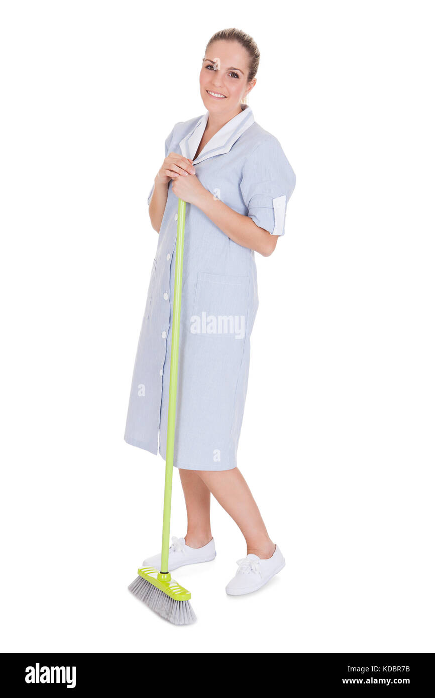 Young Maid Cleaning Floor With Mop Over White Background Stock Photo ...