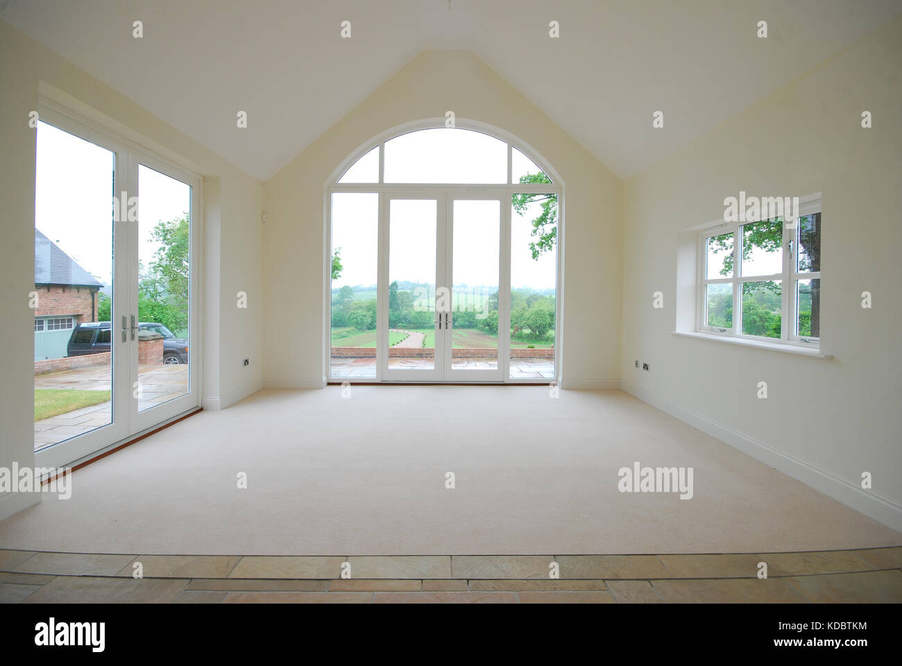 Large high ceiling extension in new build  house Stock Photo