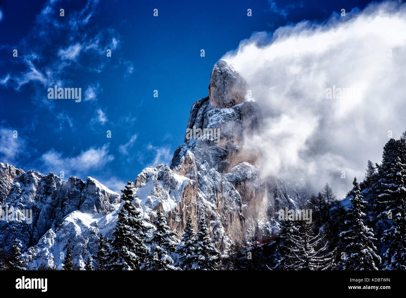 winter mountain landscape covered with clouds Stock Photo