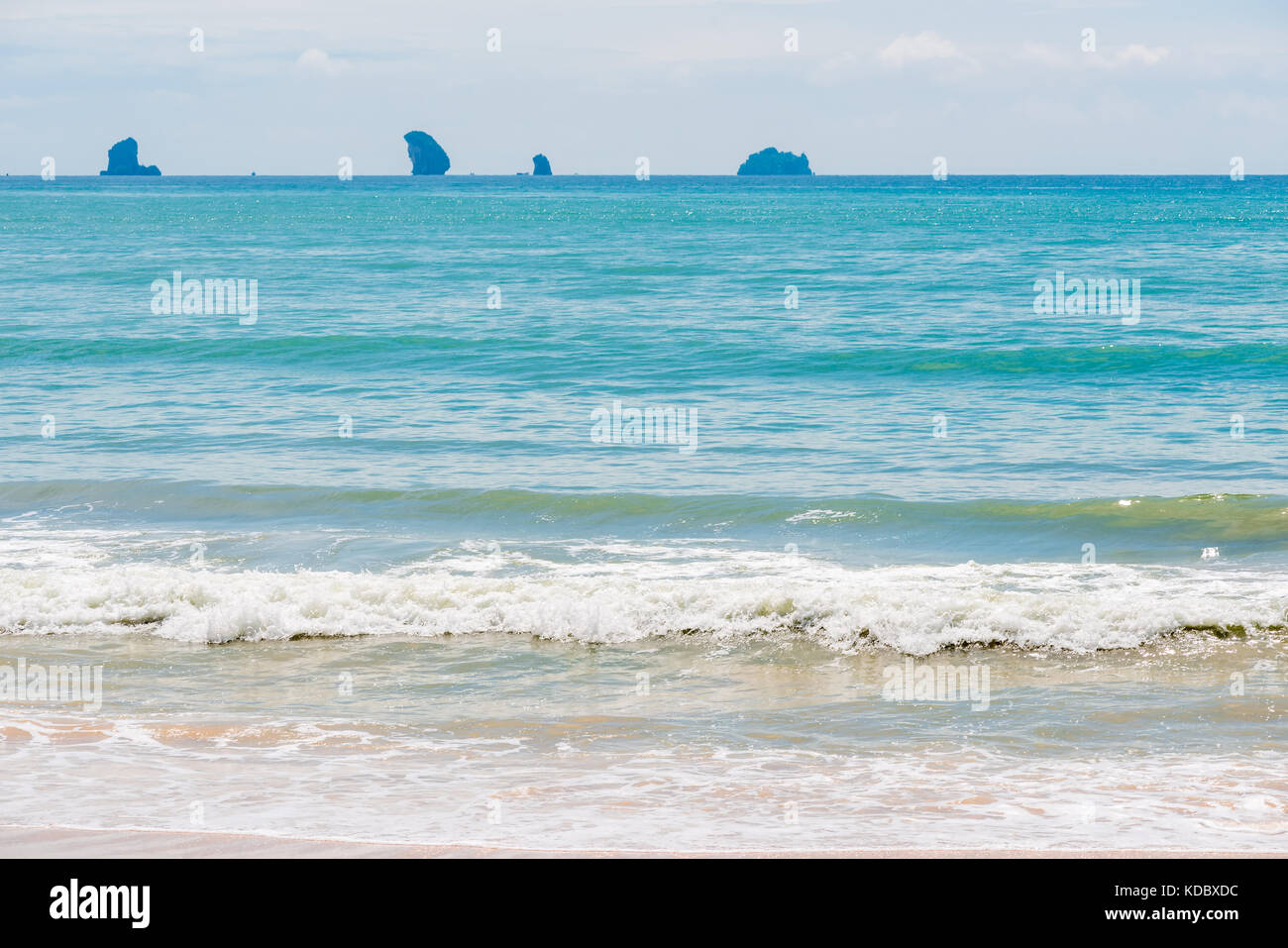 See With Rocks view of the sea, rocks are visible on the horizon Stock Photo - Alamy