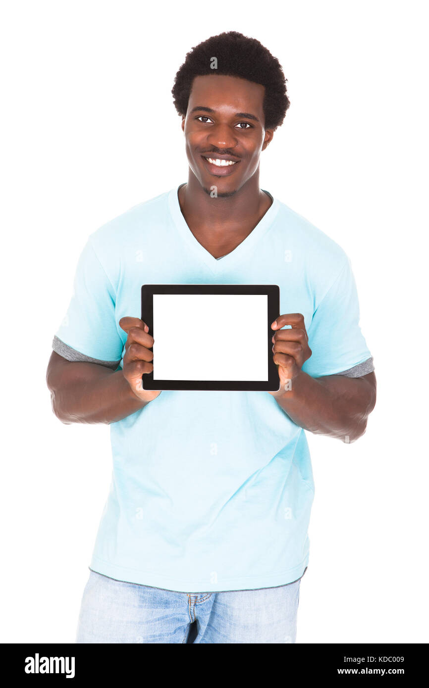 Young African Man Showing Digital Tablet Isolated Over White Background ...