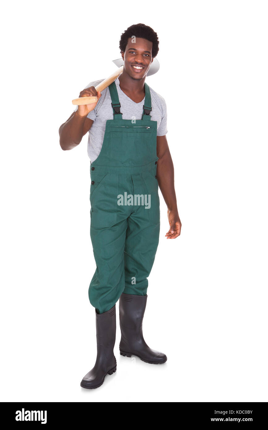 Happy Male Gardener Holding Shovel Over White Background Stock Photo ...