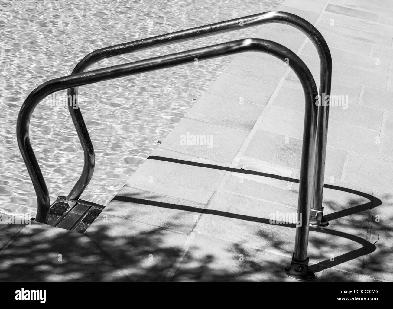 Black and white swimming pool in Perugia countryside. Hot sunny day Stock Photo