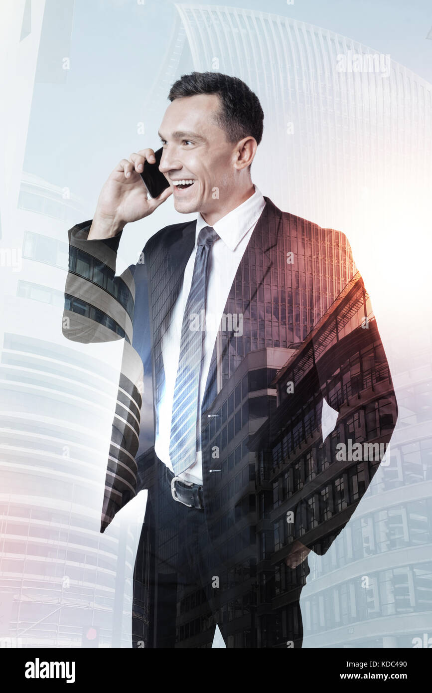 Friendly man in a suit having a pleasant talk Stock Photo Alamy