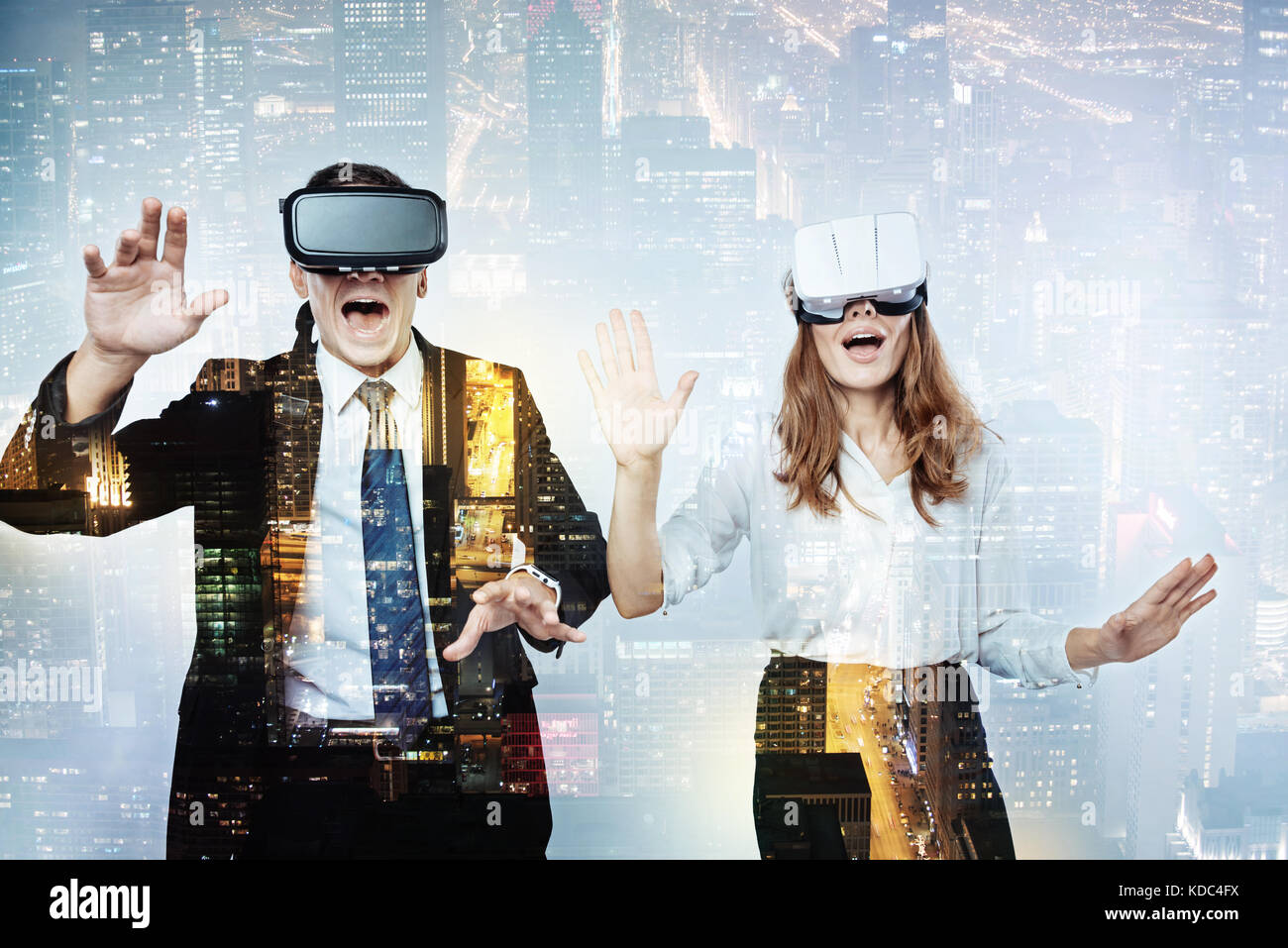 Unbelievable feelings of people in virtual reality glasses Stock Photo -  Alamy, image size:1300x957