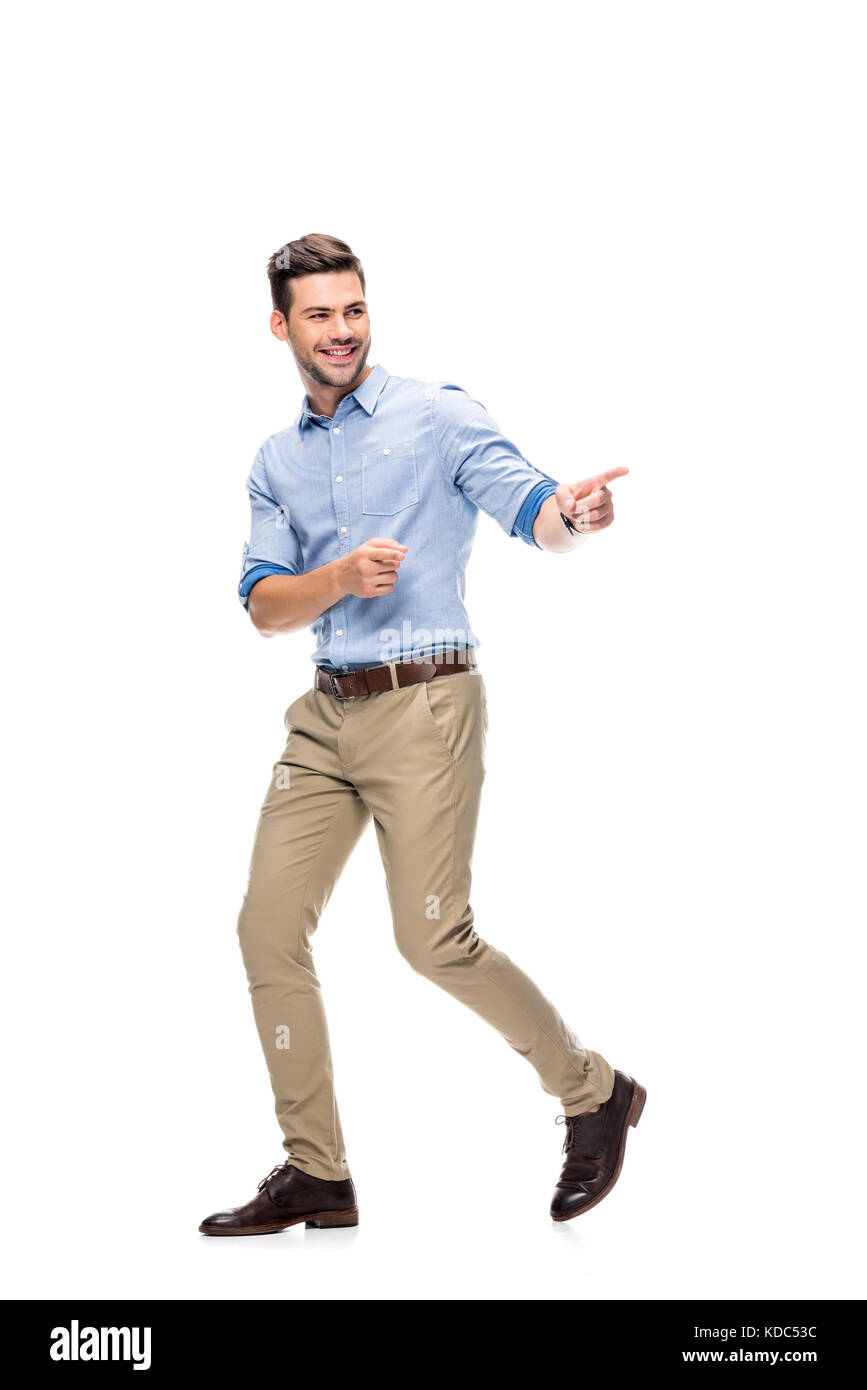 man walking and pointing at side Stock Photo
