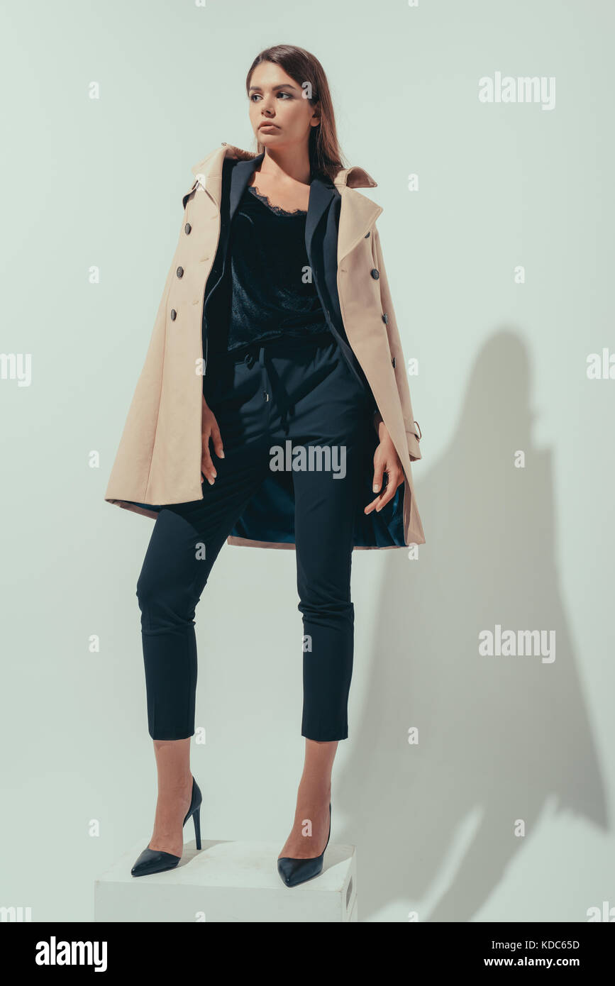 girl in trench coat Stock Photo Alamy