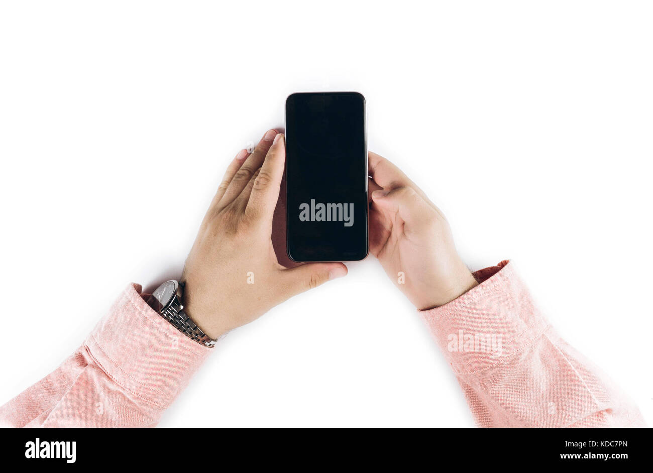 Man hands holding the black smartphone with blank screen, isolated on ...
