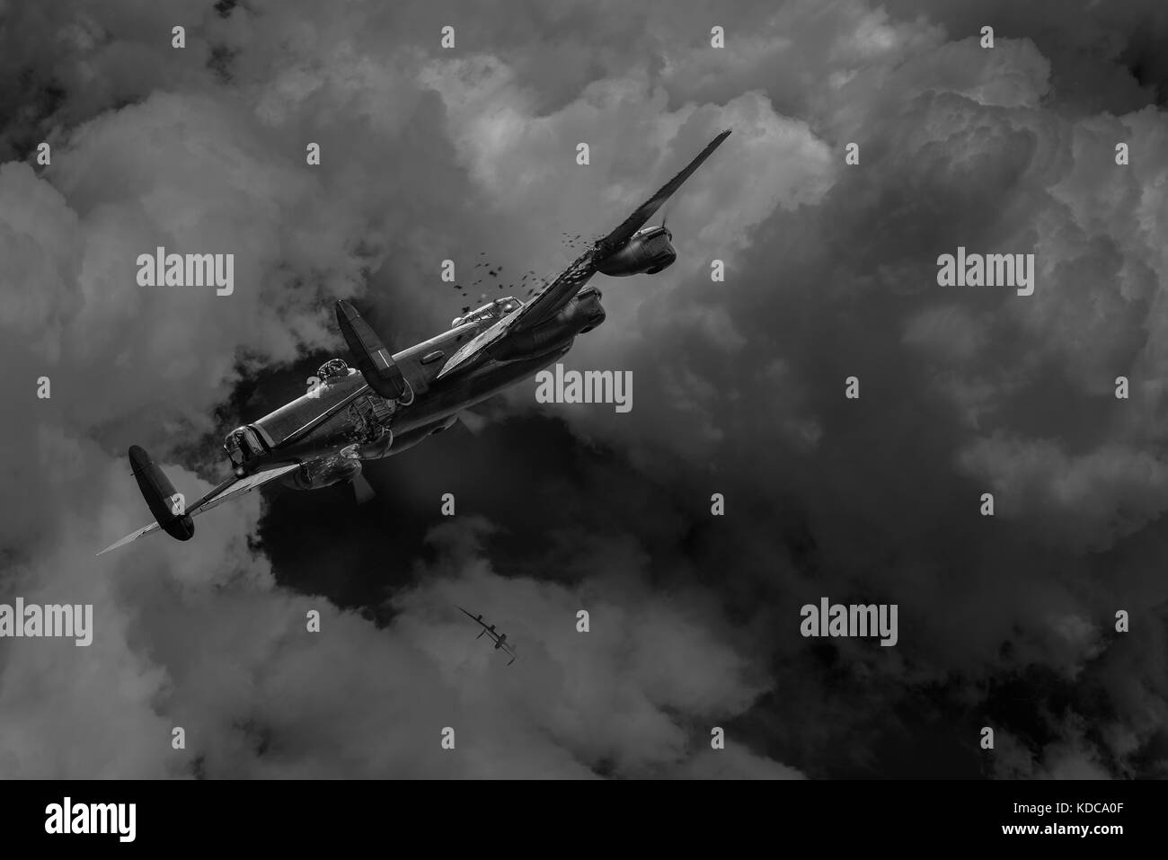 460 Squadron RAAF Lancaster ND968, AR-O 'Oboe' lurches violently into a downward spiral after being hit over Alsace by another Lanc, which falls away  Stock Photo