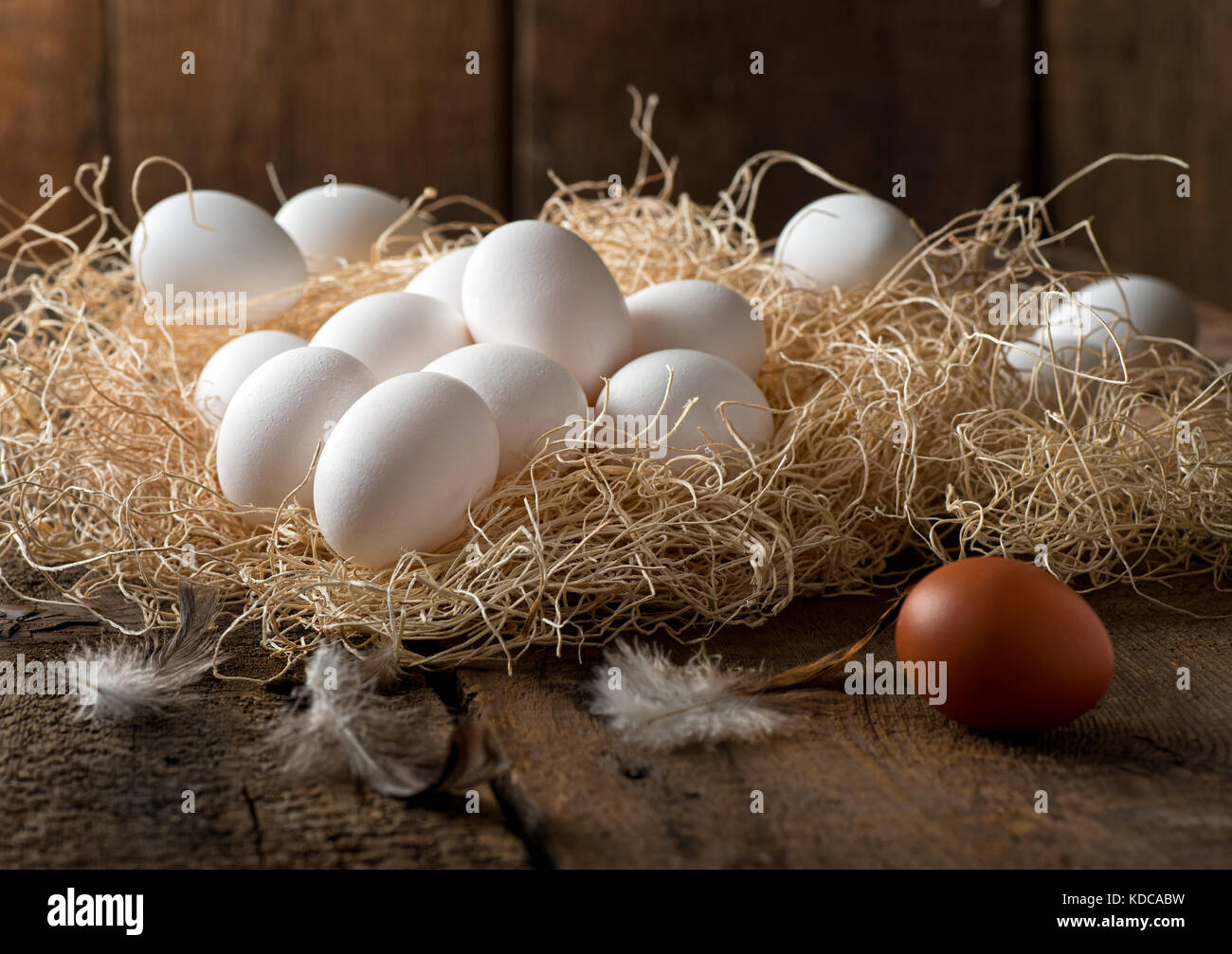 Delicious fresh eggs on straw in a rustic farm setting Stock Photo - Alamy