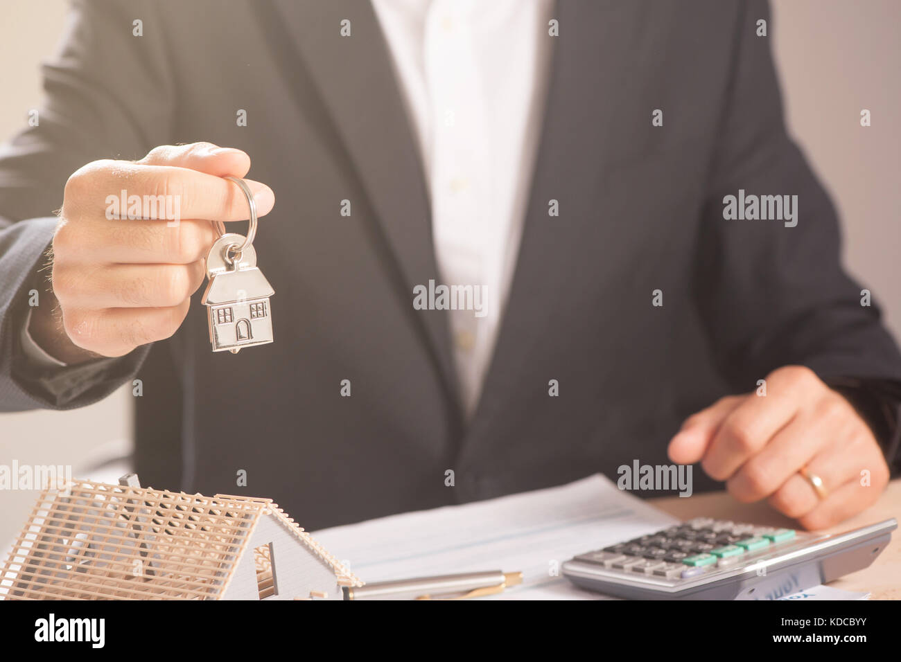 House key in hand hi-res stock photography and images - Alamy