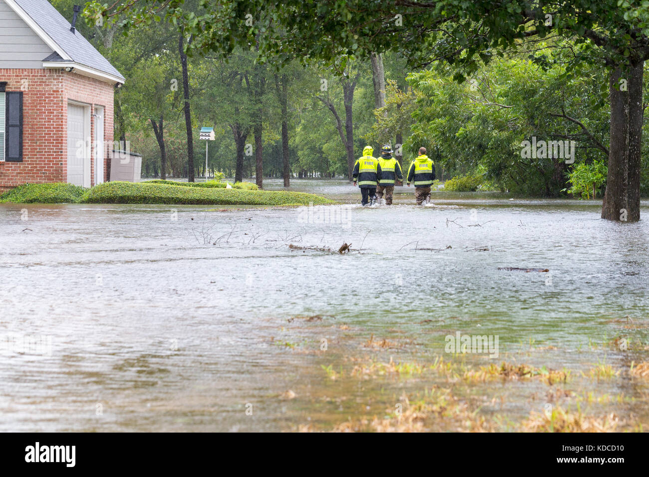 The first responders from Missouri City Fire Station 4 inspect flooded