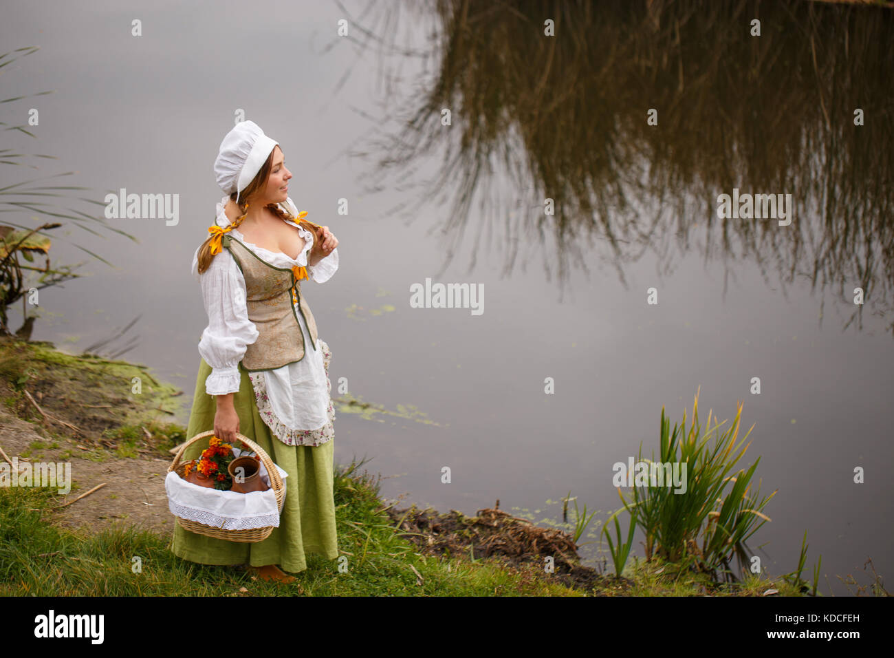 Peasant woman basket walks hi-res stock photography and images - Alamy