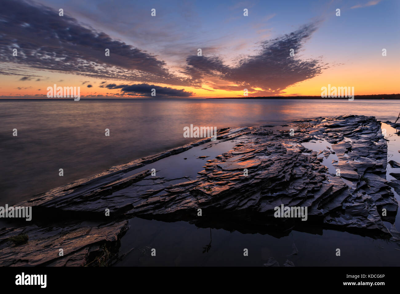 A dramatic sunrise over Lake Superior at Union Bay Campground in the Porcupine Mountain Wilderness Area Stock Photo