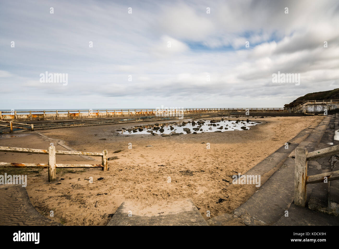 Daytime Long exposure of Tynemouth outdoor swimming pool in North Tyneside under renovation Stock Photo