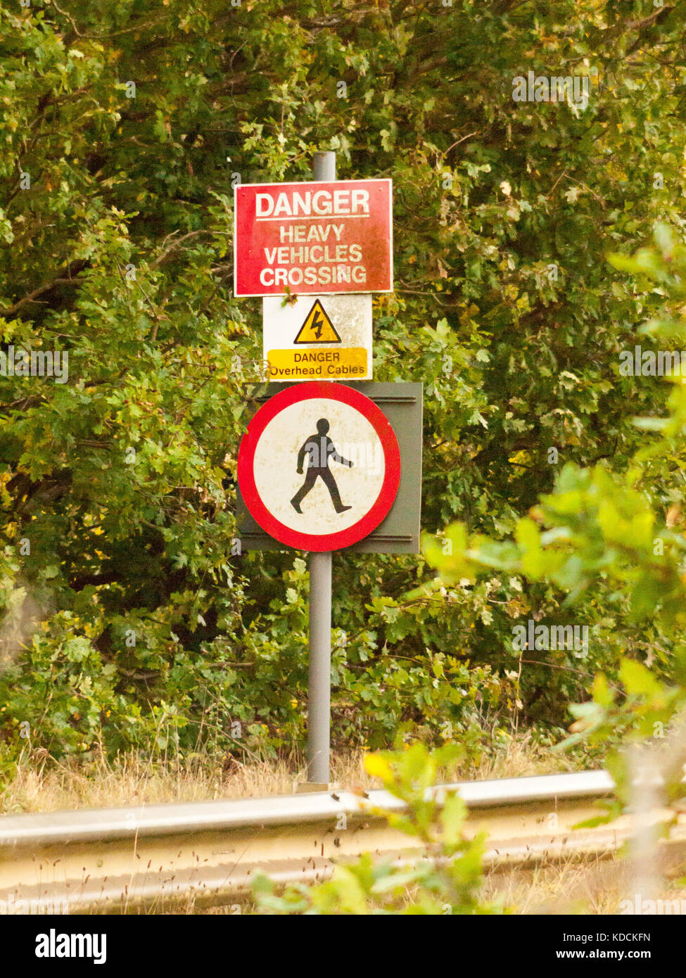 road signs on pole danger heavy vehicles crossing; essex; england; uk Stock Photo