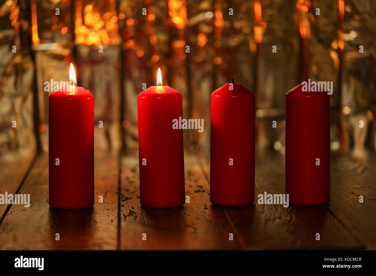 Advent Season, four candles burning. Advent background Stock Photo Alamy
