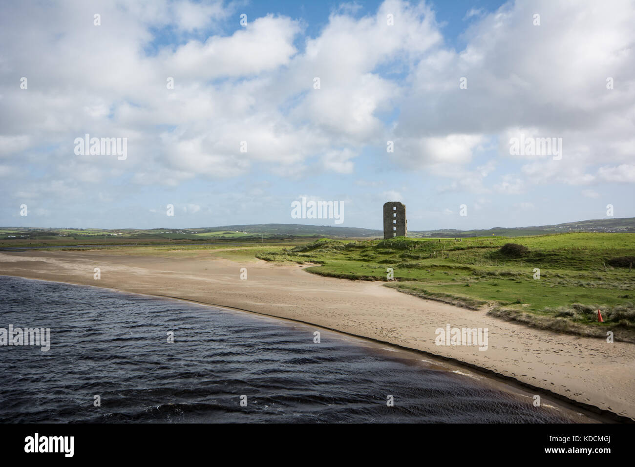 Landscape view of Dough Castle at the Castle Golf Course on the Inagh river estuary along the Wild Atlantic Way near Lahinch in county Clare, Ireland Stock Photo
