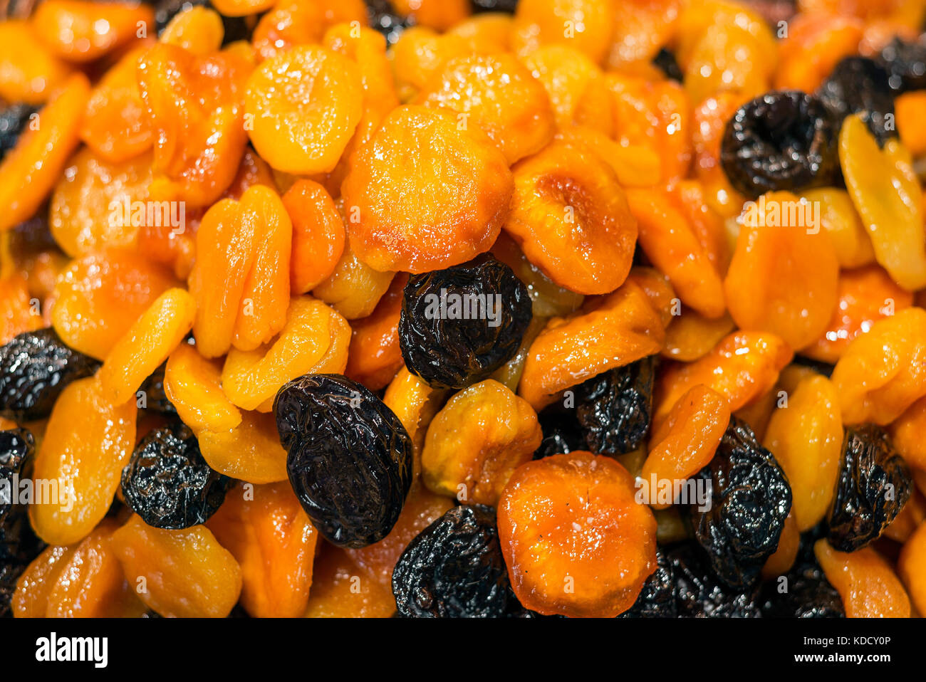 healthy natural honey glazed sundried dried apricot and prune fruit mix Stock Photo