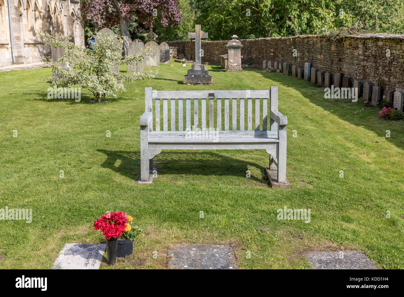 A Wooden Bench In A Church Yard Place Of Contemplation Stock