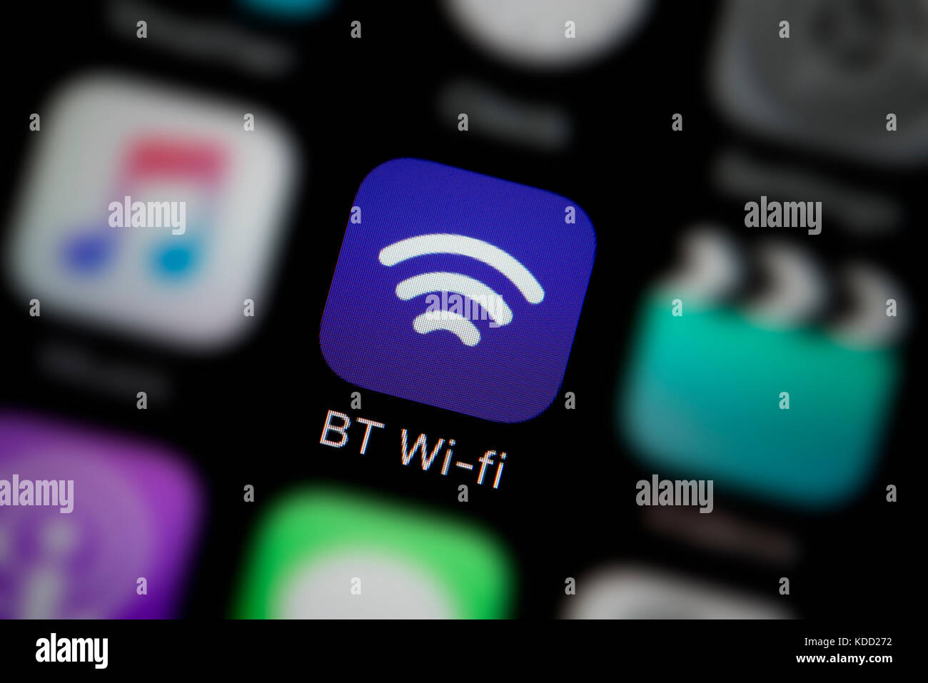 A close-up shot of the logo representing BT wi-fi app icon, as seen on the screen of a smart phone (Editorial use only) Stock Photo