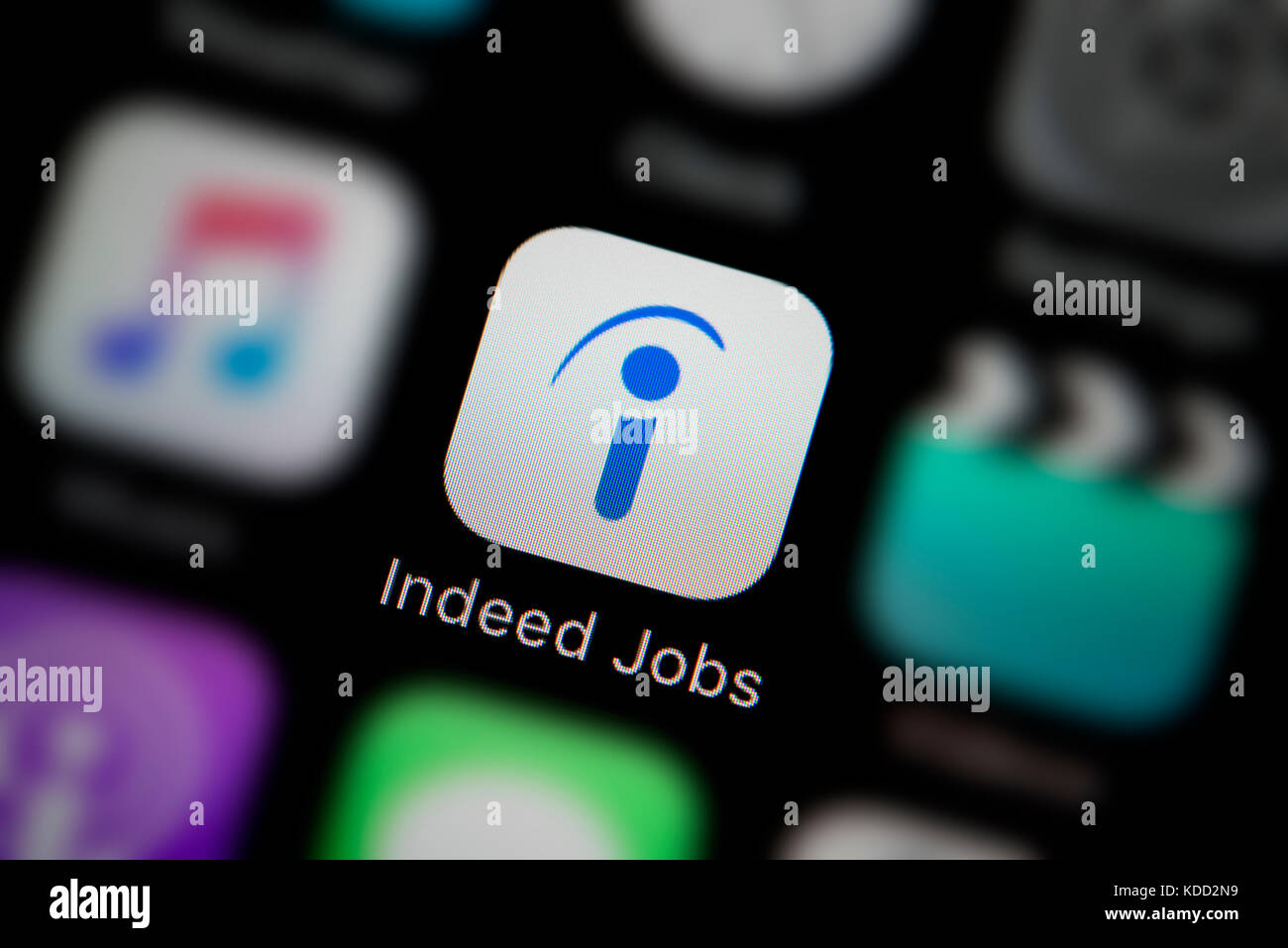 A close-up shot of the logo representing Indeed Jobs app icon, as seen on the screen of a smart phone (Editorial use only) Stock Photo