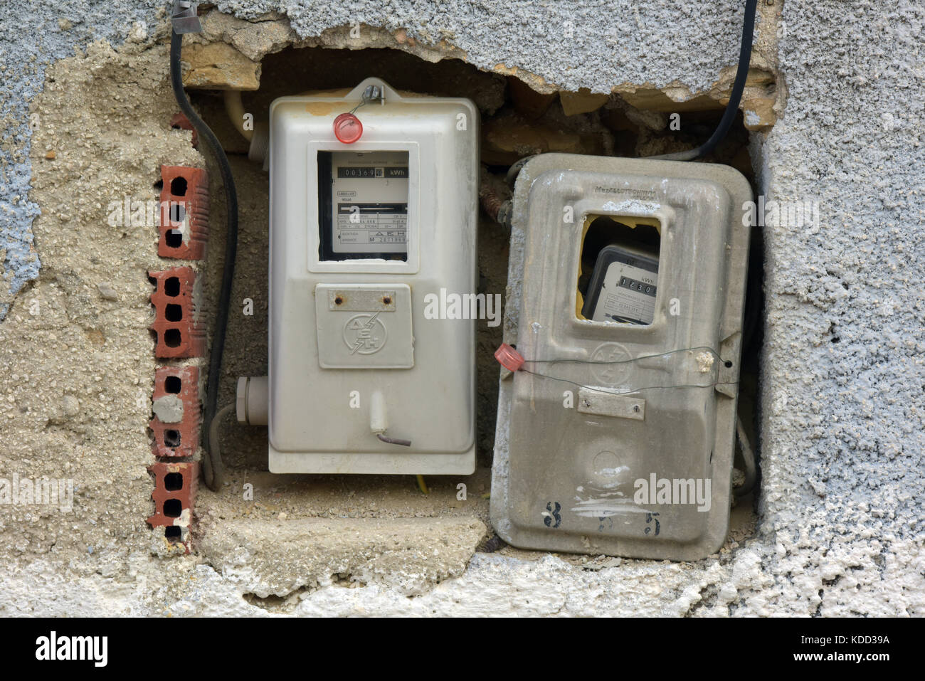 electricity and gas meters badly installed in an unsafe way on houses