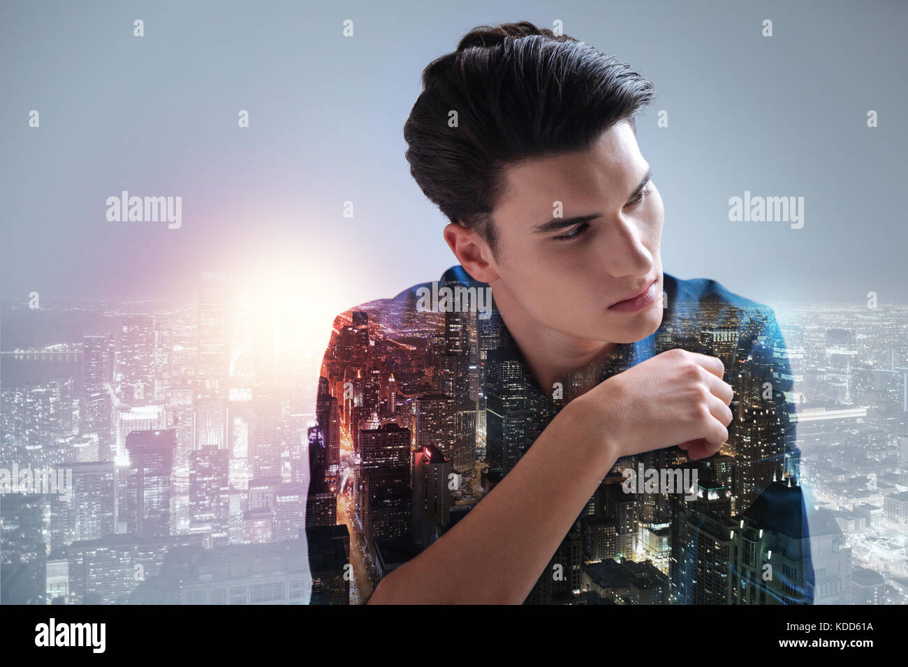 Good looking teenager averting his eyes Stock Photo - Alamy