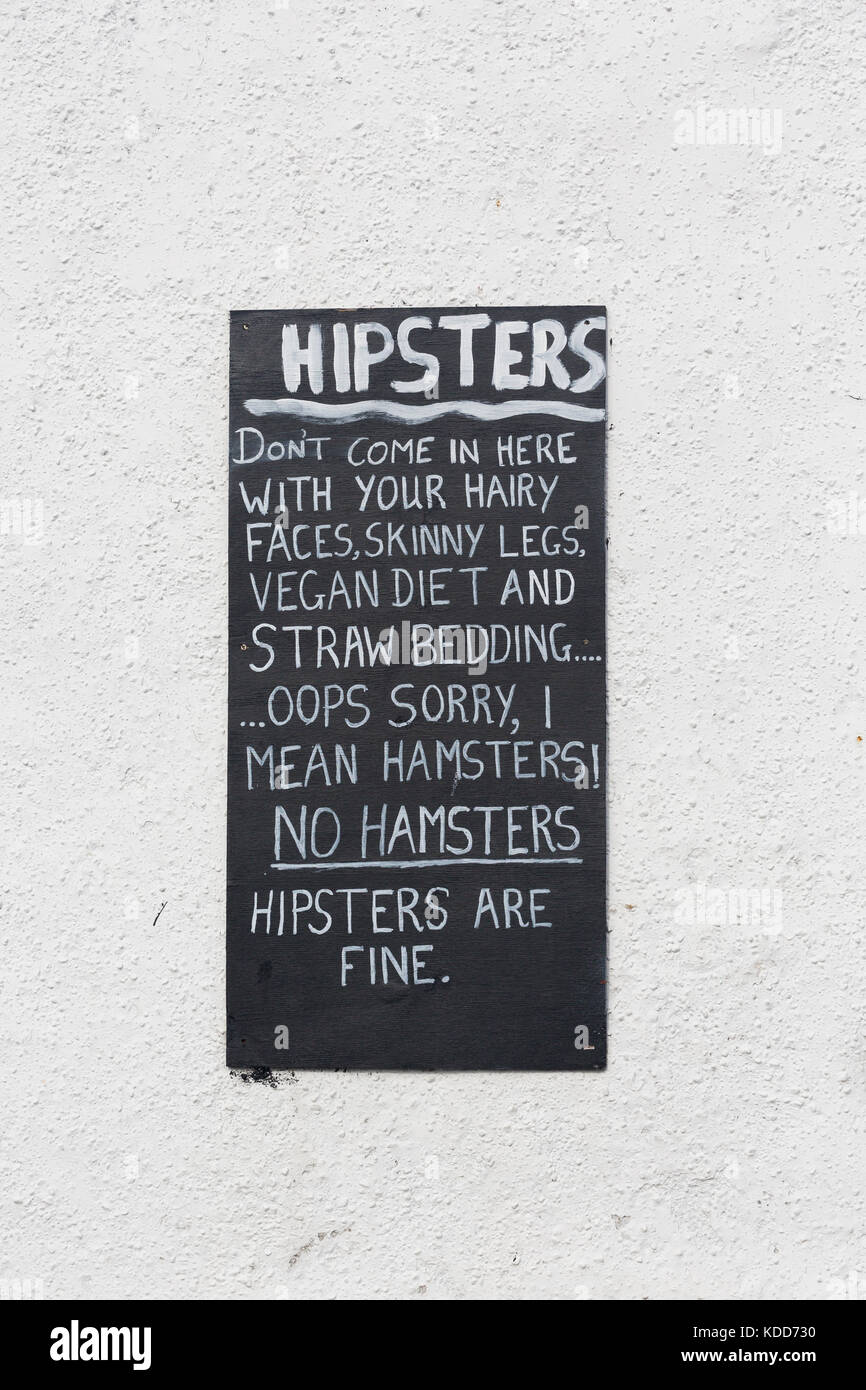 Funny sign outside pub confusing hipsters with hamsters Stock Photo