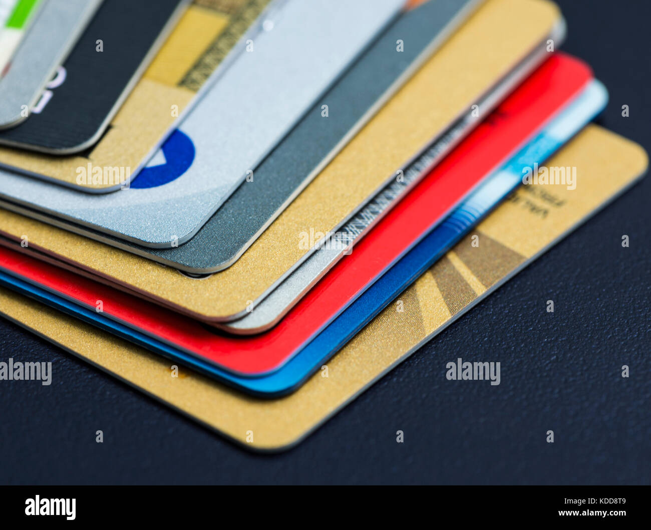 Stack of multicolored credit cards close-up Stock Photo - Alamy