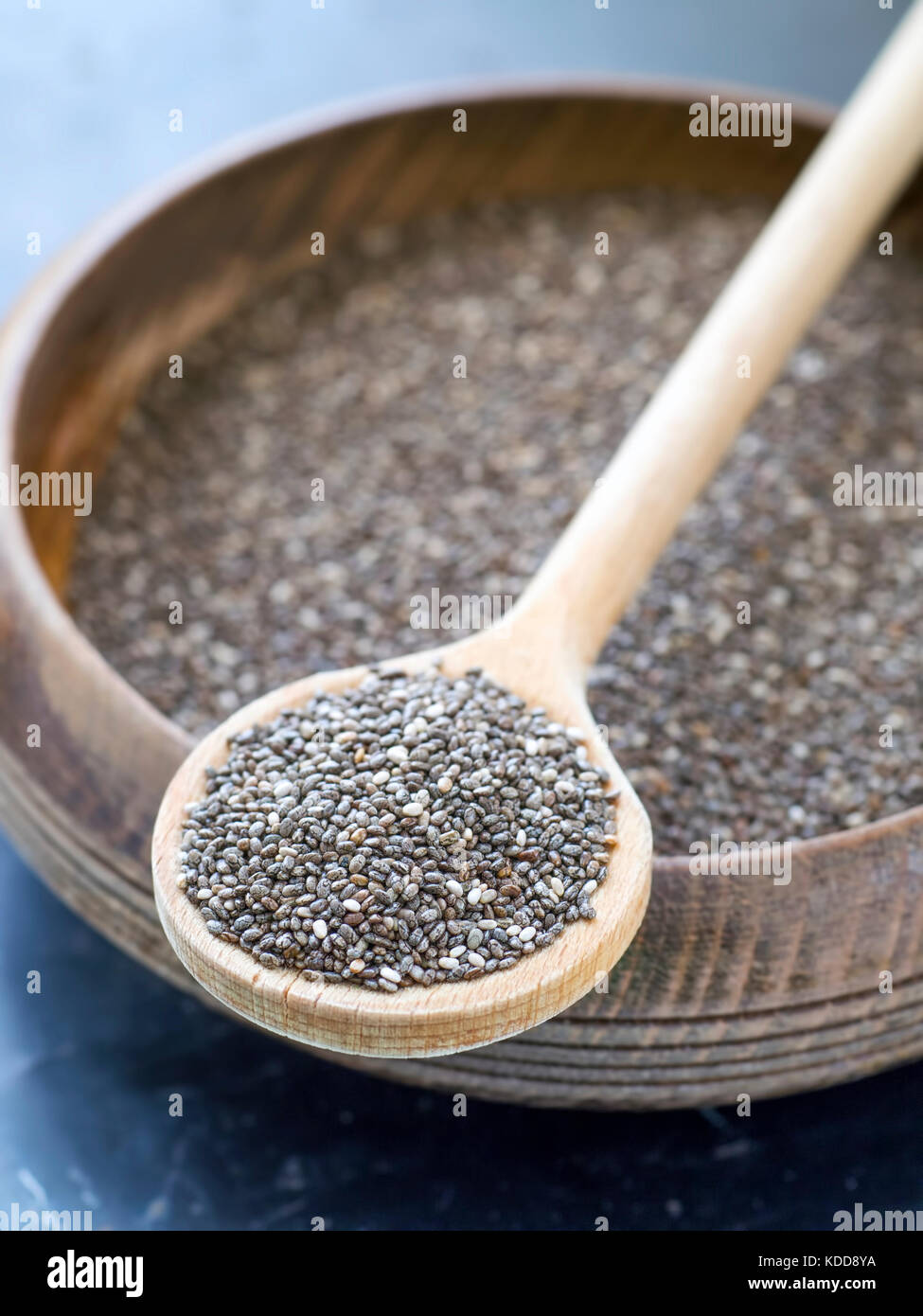 Chia seeds closeup, dark background Stock Photo - Alamy