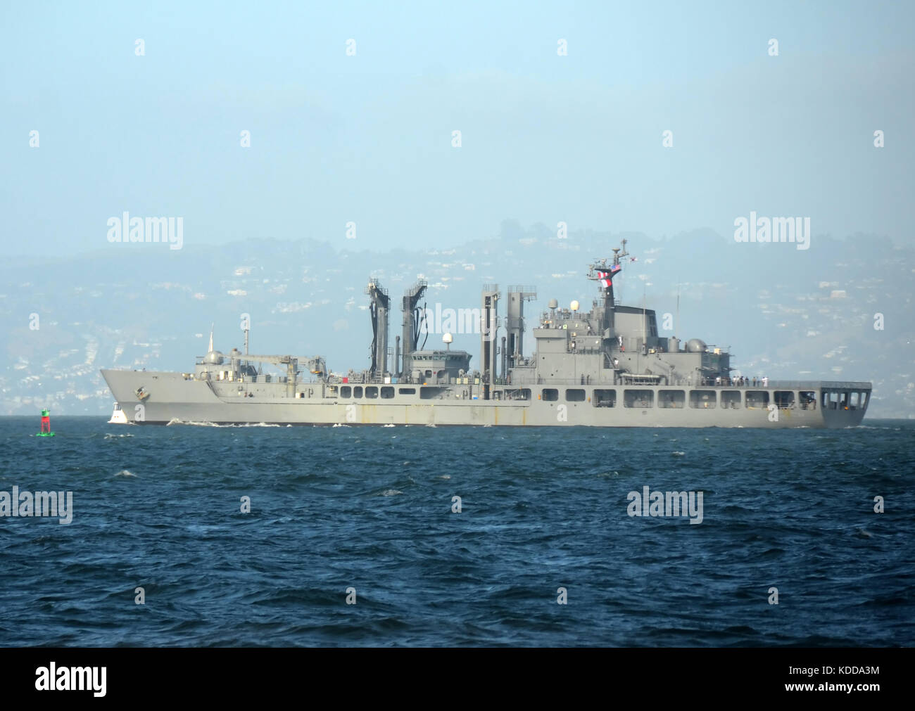 Modern warship departing on a mission Stock Photo