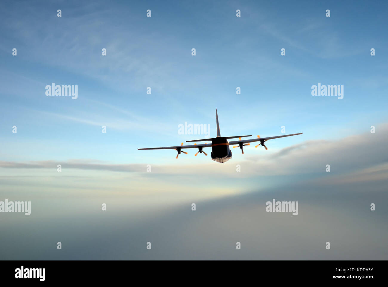 Turboprop airplane flying at high altitude rear view Stock Photo - Alamy