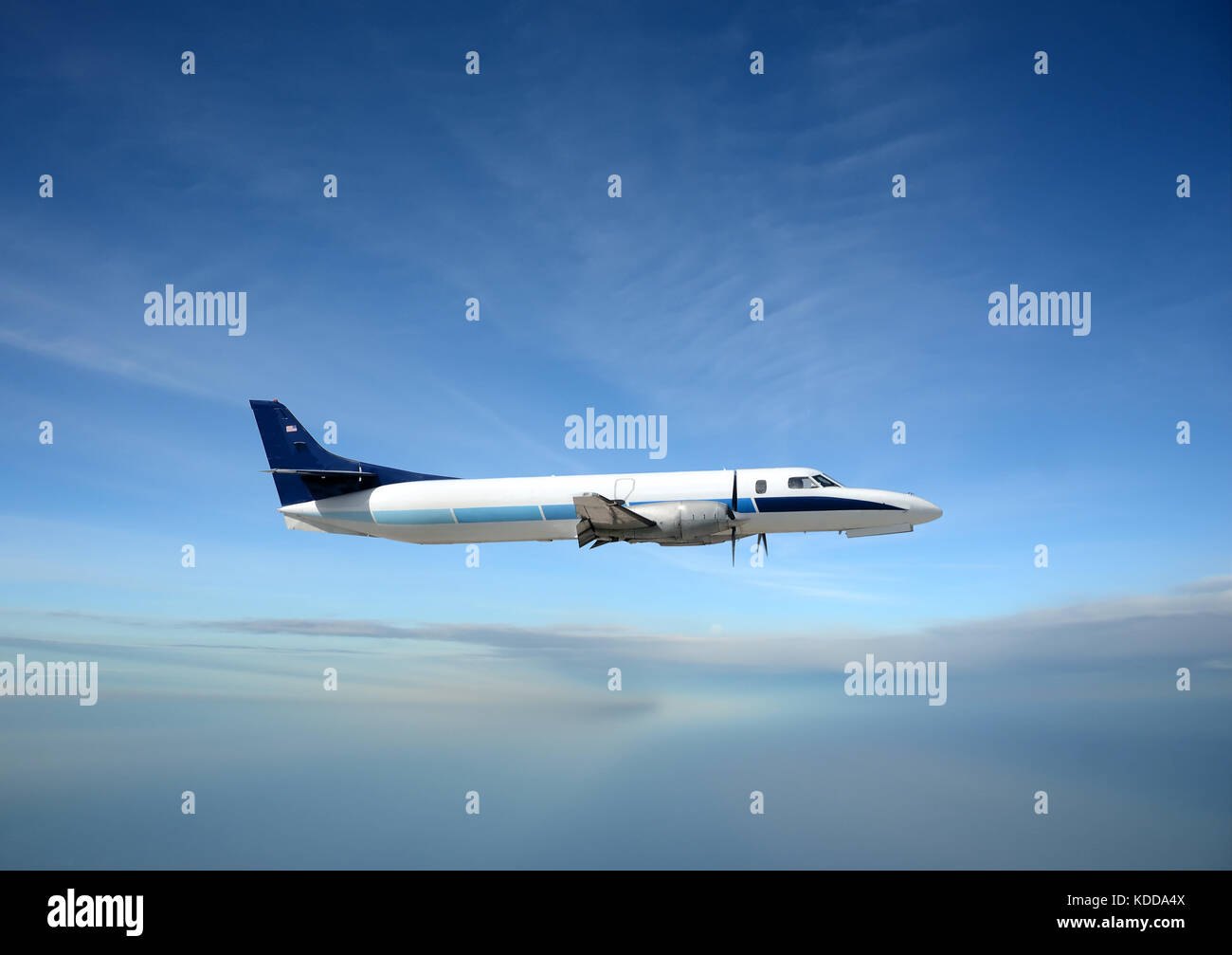 Turboprop airplane in flight Stock Photo - Alamy
