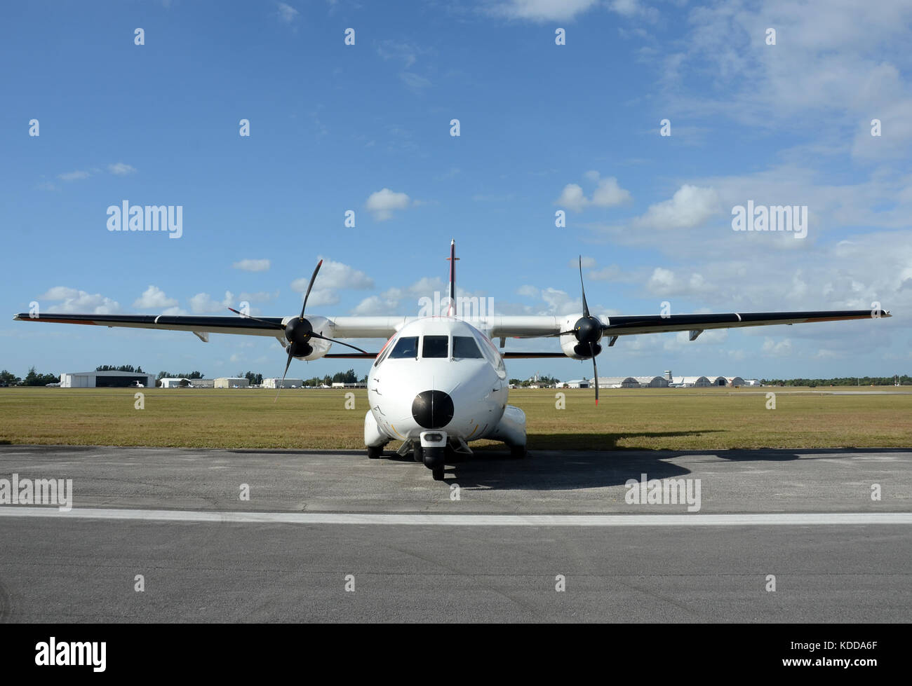Modern turboprop airplane on the ground front view Stock Photo