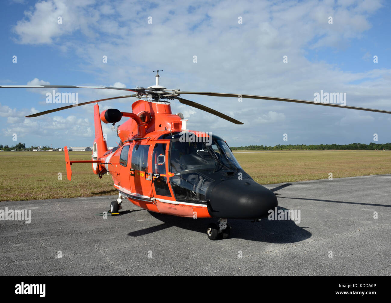 Modern Coast Guard helicopter resting between flights Stock Photo