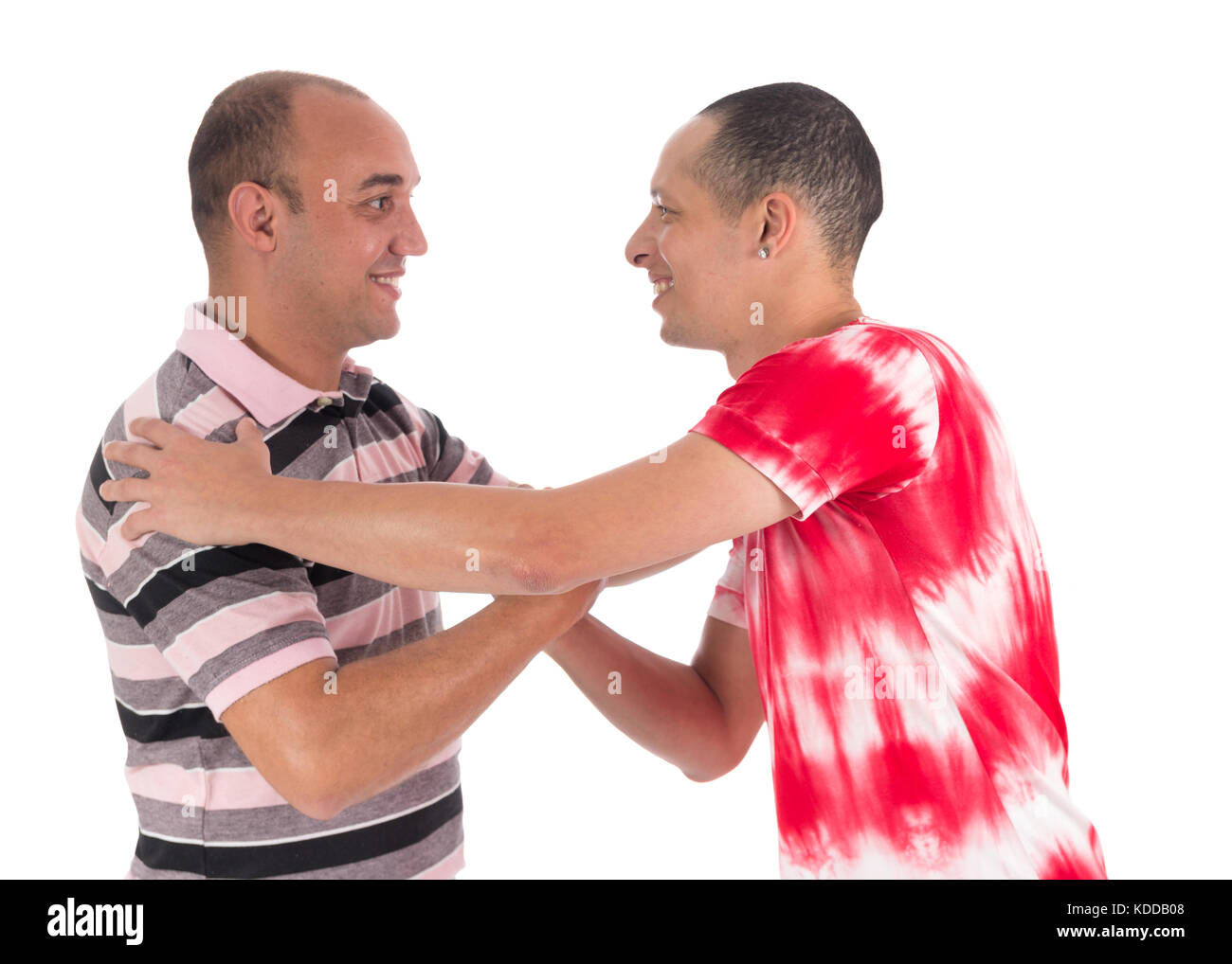 Two friends meet and greet each other. Cordiality and fraternity. White background Stock Photo