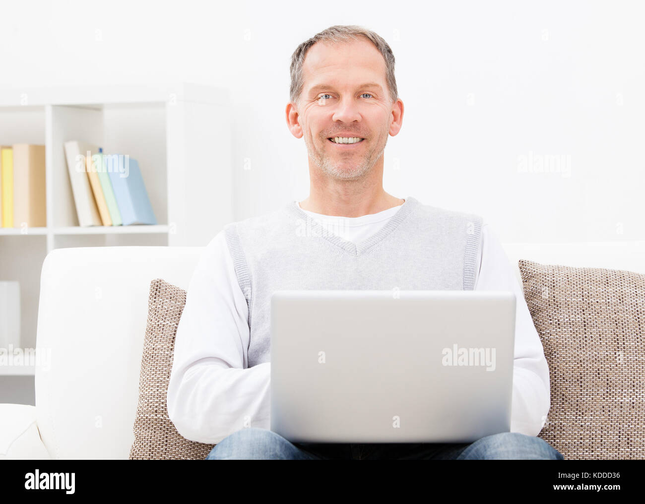 Senior man sitting couch hi-res stock photography and images - Alamy