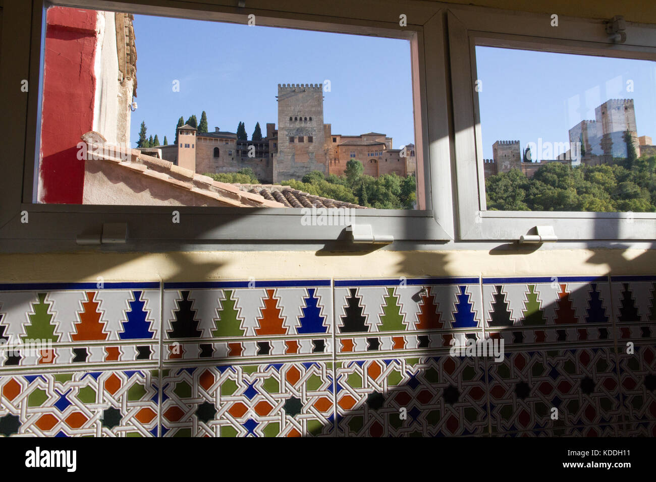 Alhambra view by window inside Albayzin house, Granada Spain Stock Photo