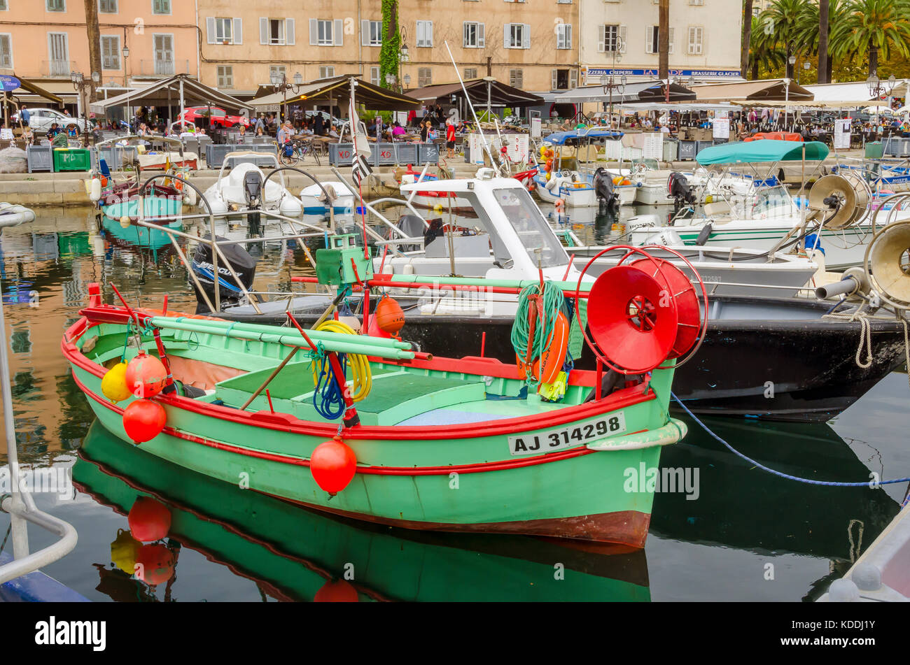 Green and red fishing boat in the habor marina, Ajaccio, Corsica, France. Stock Photo