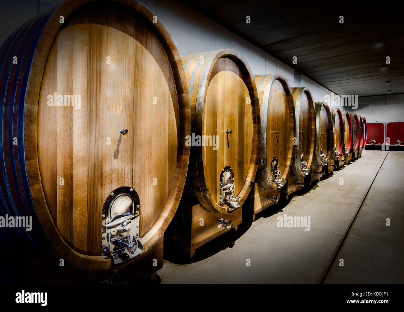 big barrels of ageing wines in nortern italy Stock Photo
