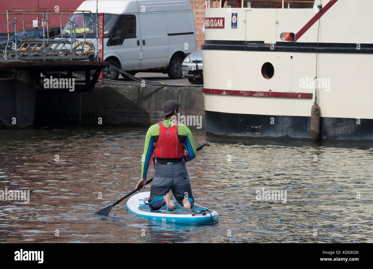 Paddle boarding in Gloucester docks Stock Photo Alamy