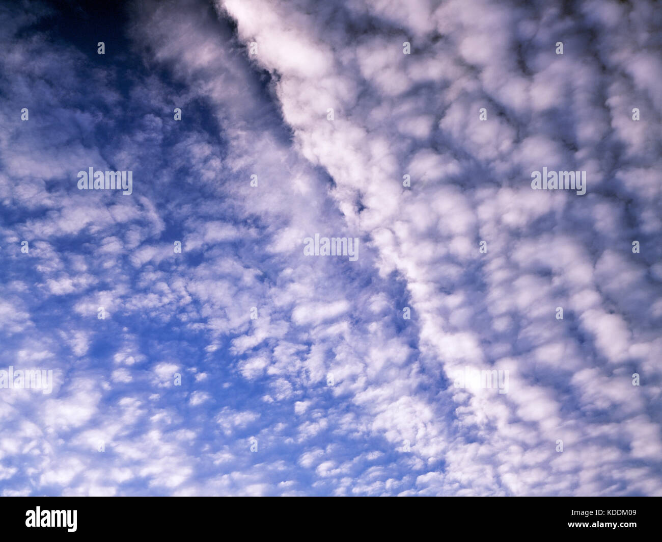mackerel sky over Llyn Padarn, is it high or is it low? Altocumulus of stratocumulus Stock Photo