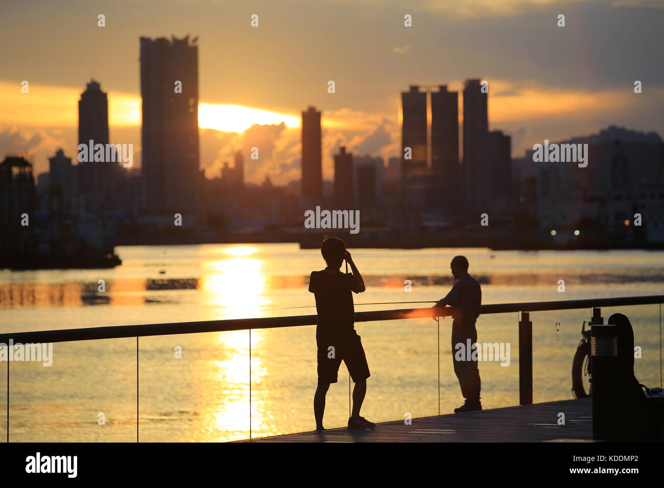 sunset of city in hong kong Stock Photo - Alamy