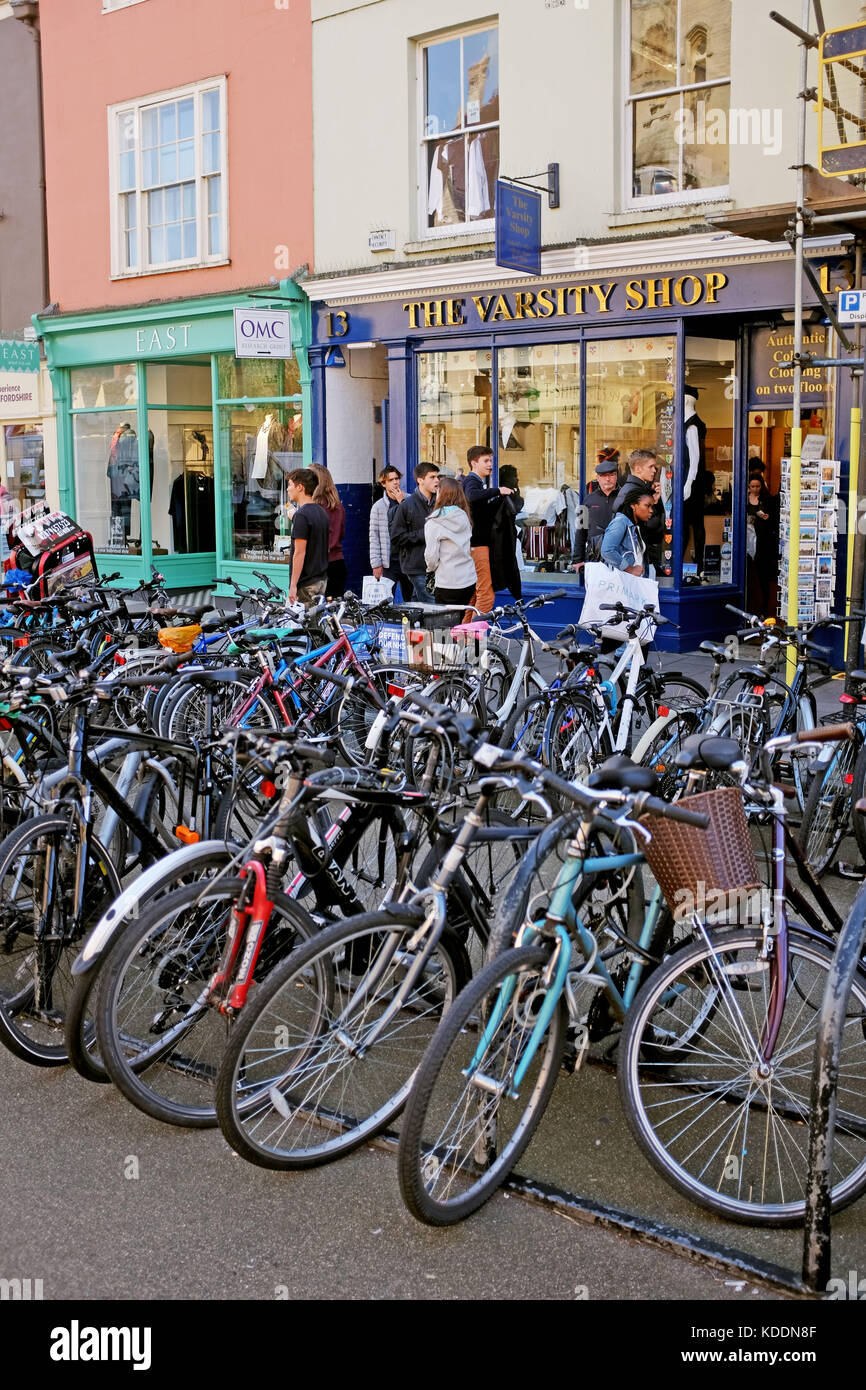 Oxford Oxfordshire UK - Cycle racks outside the Varsity clothing shop in the centre of the university city Stock Photo