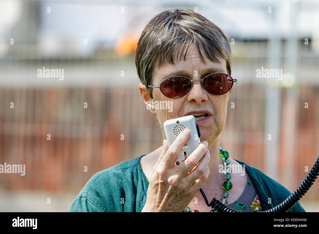Molly Scott Cato,Green Party MEP for the South West is pictured speaking to protesters during the Going backwards on climate change rally in Bristol Stock Photo