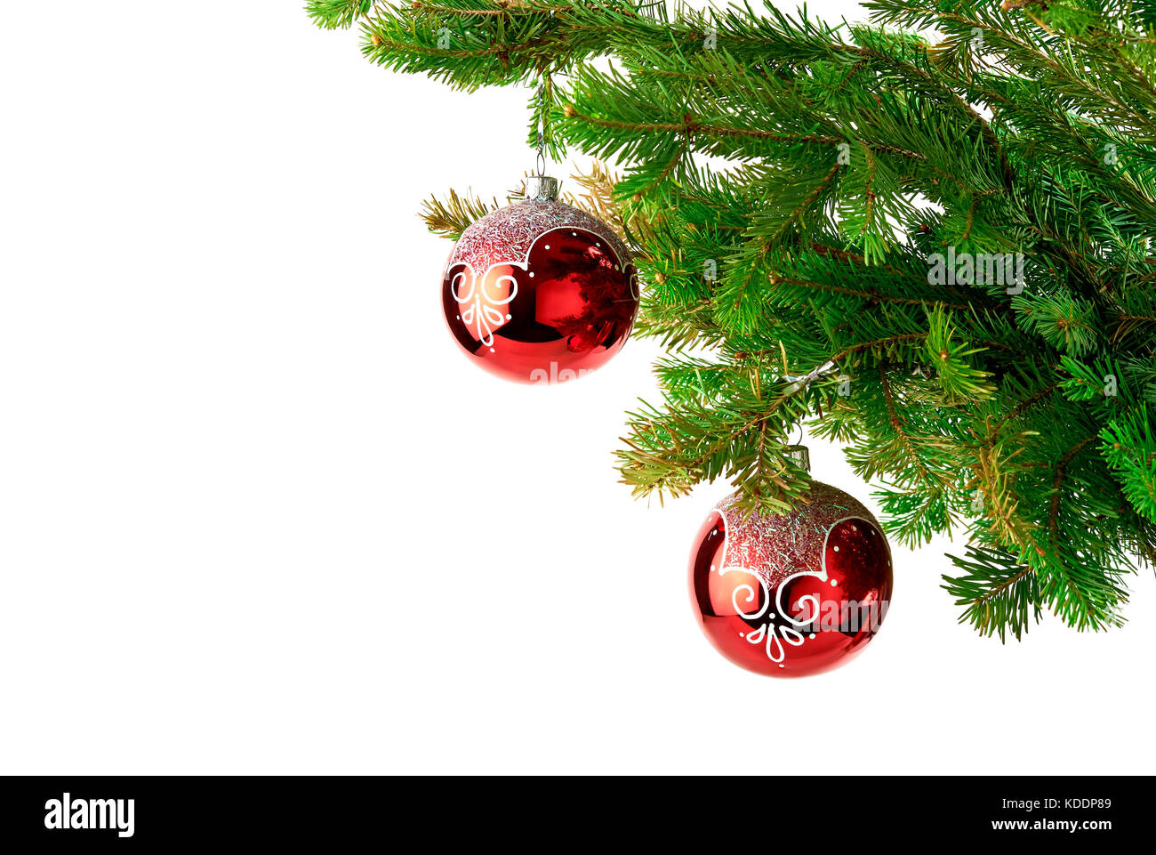 Christmas background with fir tree branches and red decoration baubles ...