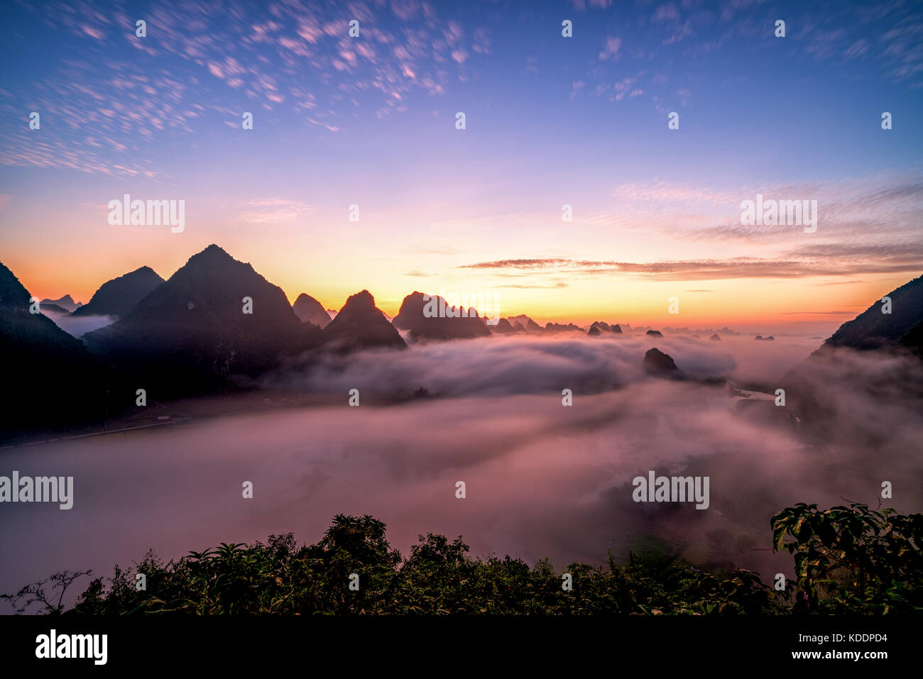 Royalty high quality free stock image of dawn and fog, mountains, river and rice field at Trung Khanh town, Cao Bang province, Vietnam. Stock Photo
