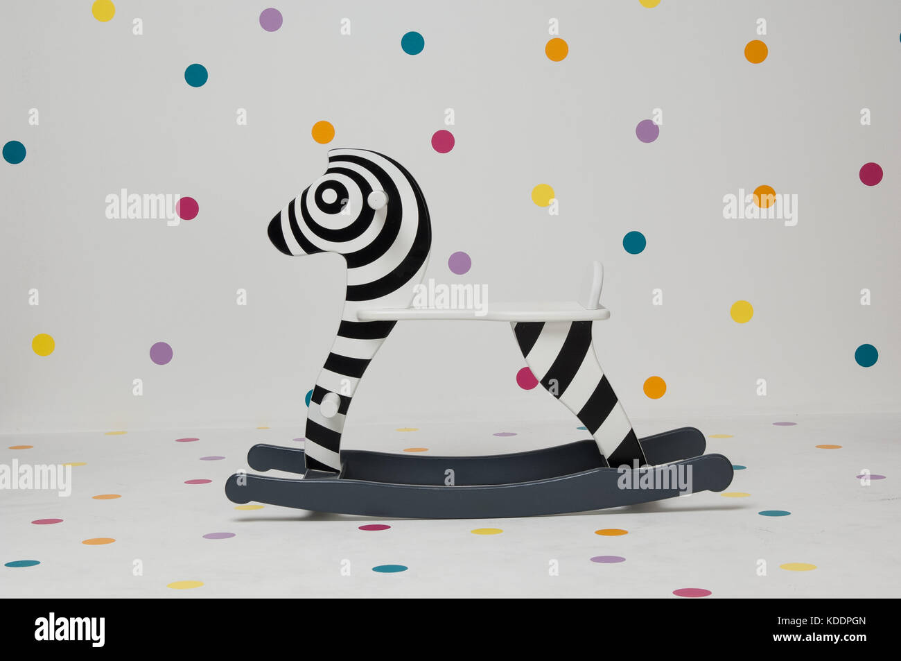 children's wooden toy zebra swing on white background Stock Photo Alamy